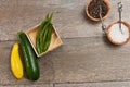 Freshly picked, ripe, raw, vegetables and wood bowls of sea salt and fresh pepper corns Royalty Free Stock Photo