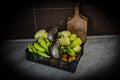 Freshly picked vegetables in a plastic crate, on the kitchen table. Fresh vegetables grown in the garden. Different types of Royalty Free Stock Photo