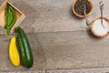 Freshly picked vegetables with wood bowls of sea salt and fresh pepper corns Royalty Free Stock Photo