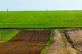 Freshly plowed field ready for planting and seeding in spring Royalty Free Stock Photo