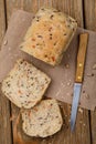 Freshly prepared bread, cut into slices with seeds of flax Royalty Free Stock Photo