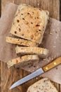 Freshly prepared bread, cut into slices with seeds of flax Royalty Free Stock Photo