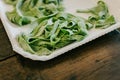 Freshly prepared Italian spinach pasta. Close-up Royalty Free Stock Photo
