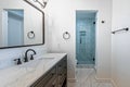 Freshly renovated bathroom with shower, toilet, mirror, faucet and sink