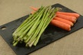 Freshly rinsed asparagus and carrots