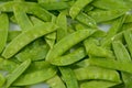 Freshly rinsed raw snap peas