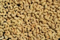 Freshly roasted cashews with salt background pattern Royalty Free Stock Photo