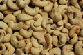 Freshly roasted cashews with salt background pattern closeup Royalty Free Stock Photo