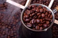 Freshly roasted coffee beans in a cezve Royalty Free Stock Photo