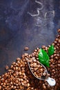 Freshly roasted coffee beans on slate Royalty Free Stock Photo