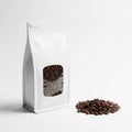 Freshly roasted coffee beans in a white packaging bag Royalty Free Stock Photo
