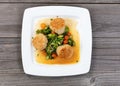 Freshly seared scallops and vegetables ready to serve