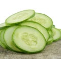 Freshly sliced cucumber on background. Royalty Free Stock Photo