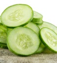 Freshly sliced cucumber on background. Royalty Free Stock Photo