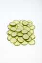 Freshly sliced cucumber  isolated on white background Royalty Free Stock Photo