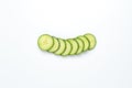 A freshly sliced cucumber roll on a white background Royalty Free Stock Photo