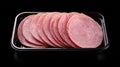 Freshly sliced ham in a black tray, ready for consumption Royalty Free Stock Photo