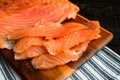 Freshly Sliced Lox on a Wooden Cutting Board Royalty Free Stock Photo