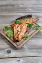 Freshly Smoked Salmon ready to eat on wooden server Royalty Free Stock Photo