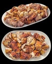 Plateful of Freshly Spit Roasted Pork Thigh Crispy Crackling Meat Slices in Oval Porcelain Trays Isolated on Black Background Royalty Free Stock Photo