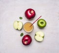 Freshly squeezed apple juice from different varieties of apples wooden rustic background top view close up Royalty Free Stock Photo