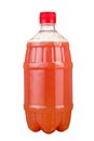 Freshly squeezed juice in a plastic bottle. Lemonade on take-away on a white background. Fresh Juice.