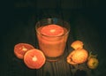 Freshly Squeezed Mandarin Juice in a Glass and Fresh Mandarins on the Wooden Table