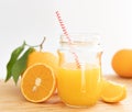 Freshly squeezed orange juice on a chopping board Royalty Free Stock Photo