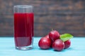 Freshly squeezed plum juice in a tall glass Royalty Free Stock Photo