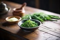 freshly steamed green beans on a rustic wooden table