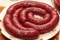 Freshly stuffed pork intestines with blood sausage mass. Organic blood sausage