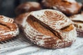 Freshly and warm baked bread rolls place on top marble counter for sell. Homemade by artisan