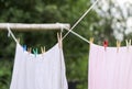 Freshly Washed Bed Linen Hanging On The Rope Outdoors