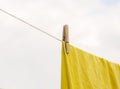 Freshly washed bed linen hanging on the rope outdoors