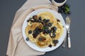 Freshmade, homemade pancakes with blueberry, dried fruits and honey. Breakfast with coffee and pancakes. Deliciious healthy food