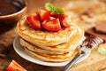 Freshmade pancakes served with strawberry and choco paste