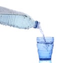 Freshness cool and clean drinking water pouring to blue glass is