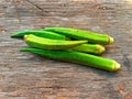 Freshness green okra on old wooden table and wood background