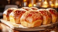 Freshness loafs of bread on wooden board on blurred bakery interior background Royalty Free Stock Photo