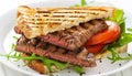 Freshness on a plate grilled beef sandwich with tomato and cheese Royalty Free Stock Photo