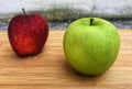Ripe green and red apple whole piece on wooden background Royalty Free Stock Photo