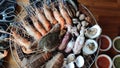 Freshness shellfish seafood, shrimp, crab, squid, Oyster, crayfish on Flame Grilled charcoal Royalty Free Stock Photo