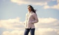 Freshness of wind. Matching style and class with luxury and comfort. Beauty and fashion look. Windy day. Girl jacket