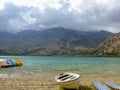 Freshwater lake Kournas with recreation equipment in Crete, Greece Royalty Free Stock Photo