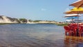 Freshwater pond in the middle of the dunes of a Brazilian tropical beach