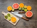 Fresly cut fruit, cutting board and knives