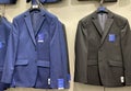 2021 New Mens dress suits / jackets hanging on store hooks blue and black color