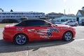 A 2016 Mustang red custom car red white and blue Horse on the side