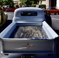 Back shot of a classic 1952 Chevy Truck 3100 gray two-toned exterior paint at a car show