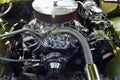 Closeup of an Engine from a Classic 1960's Green Chevy IMPALA Custom Car